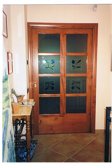 Porta scorrevole all'inglese in ciliegio tinto